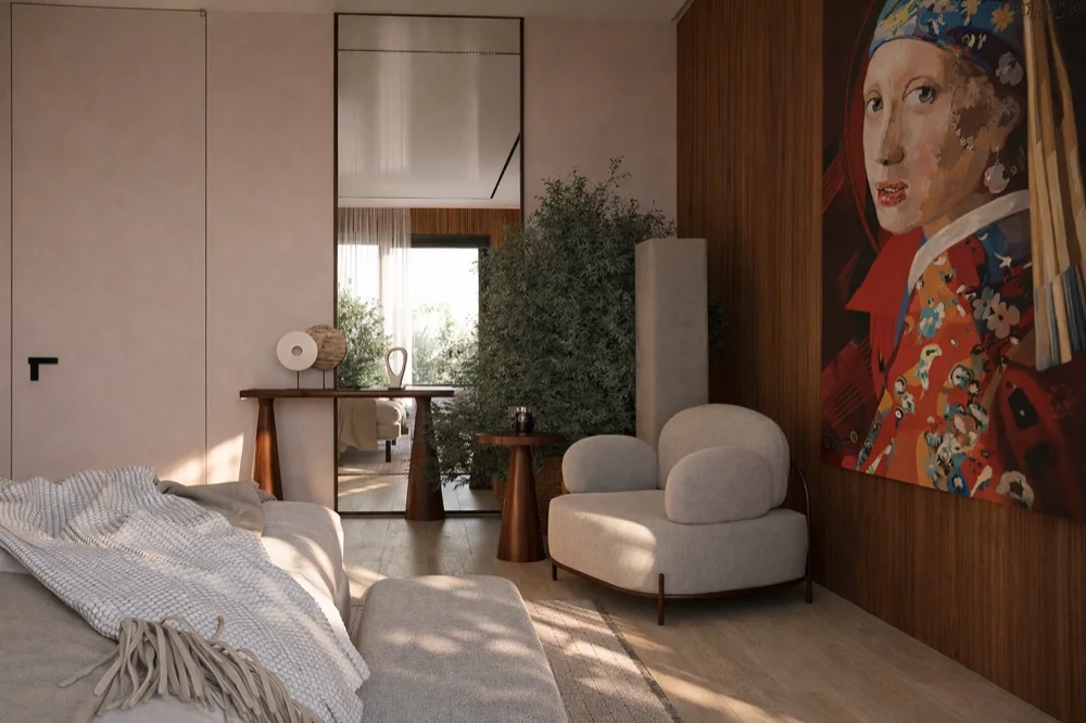 Bedroom with an armchair, mirror and a painting on the wall