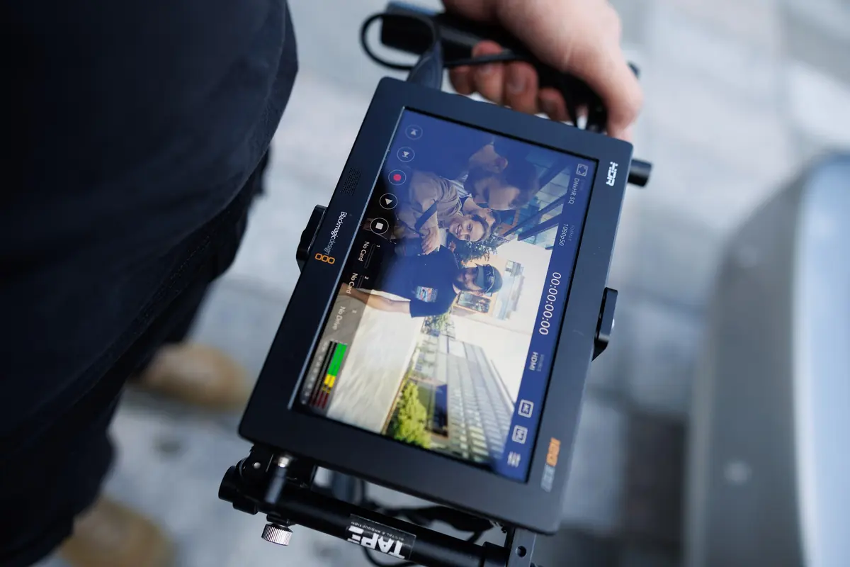 Handheld monitor during a car shoot