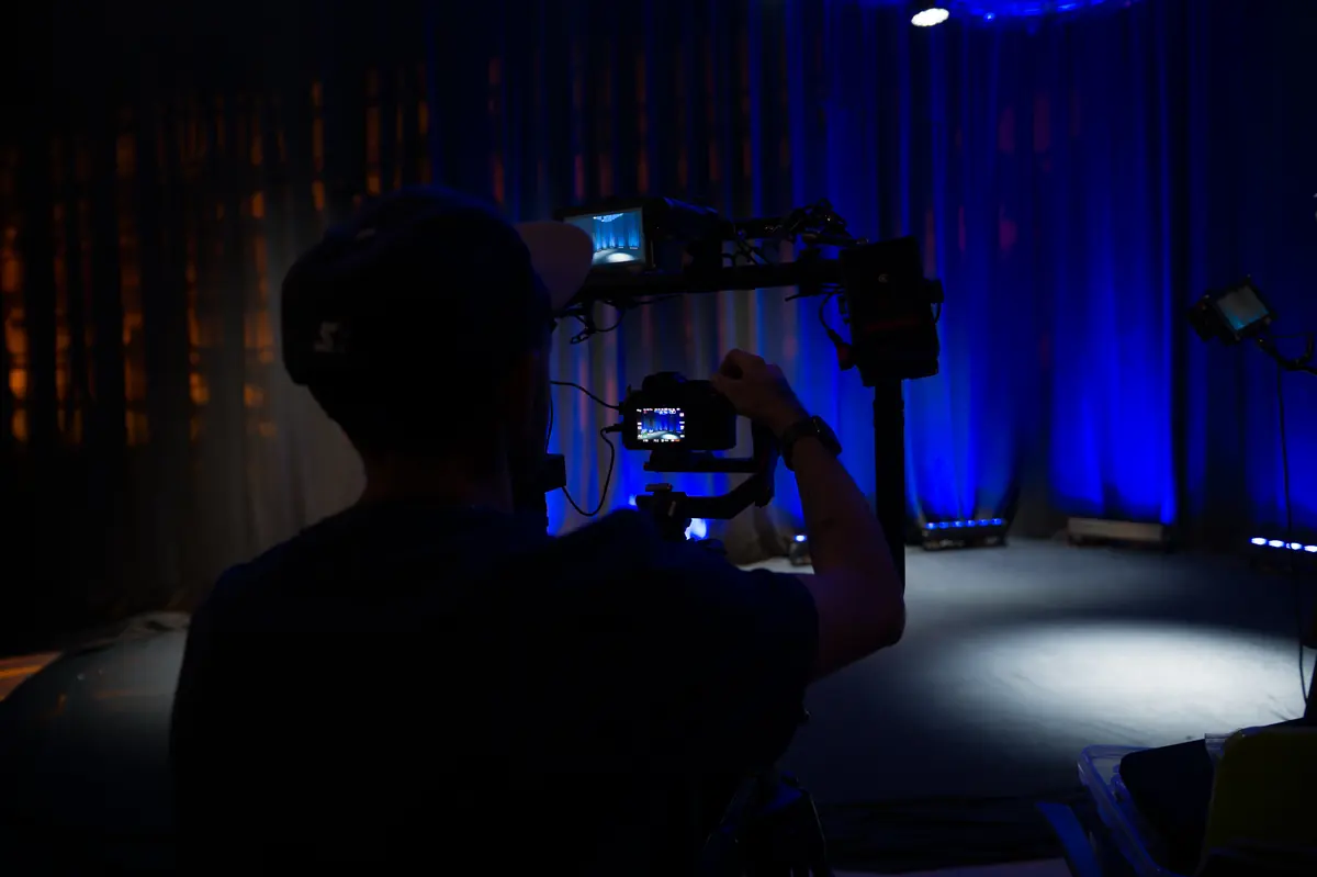 Camera operator at a stage